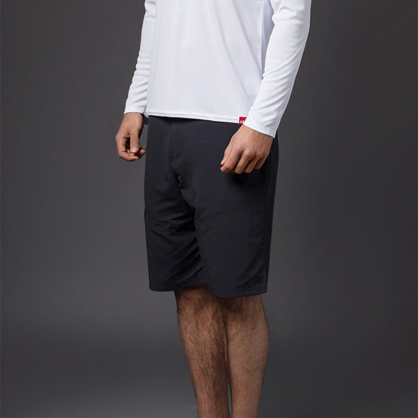 Gill UV Tec shorts i navy set bagfra, viser elastik i taljen.