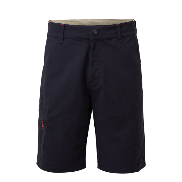 Gill UV Tec shorts i navy set foran med detaljeret fokus på stoffet.