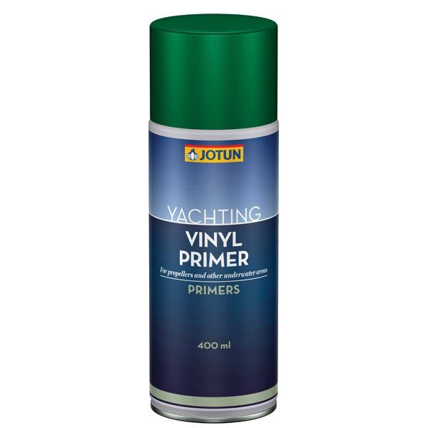 Jotun vinyl primer spray placeret på et arbejdsbord med værktøj.